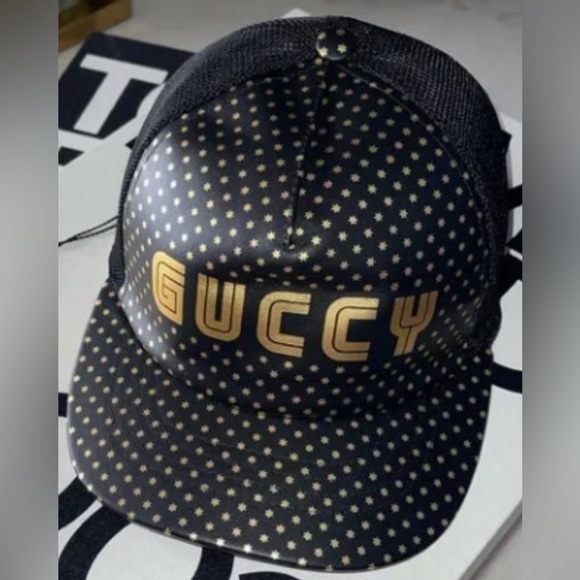 GUCCY Hat EUC Authentic black with gold stars Size L but is adjustable - Picture 1 of 1